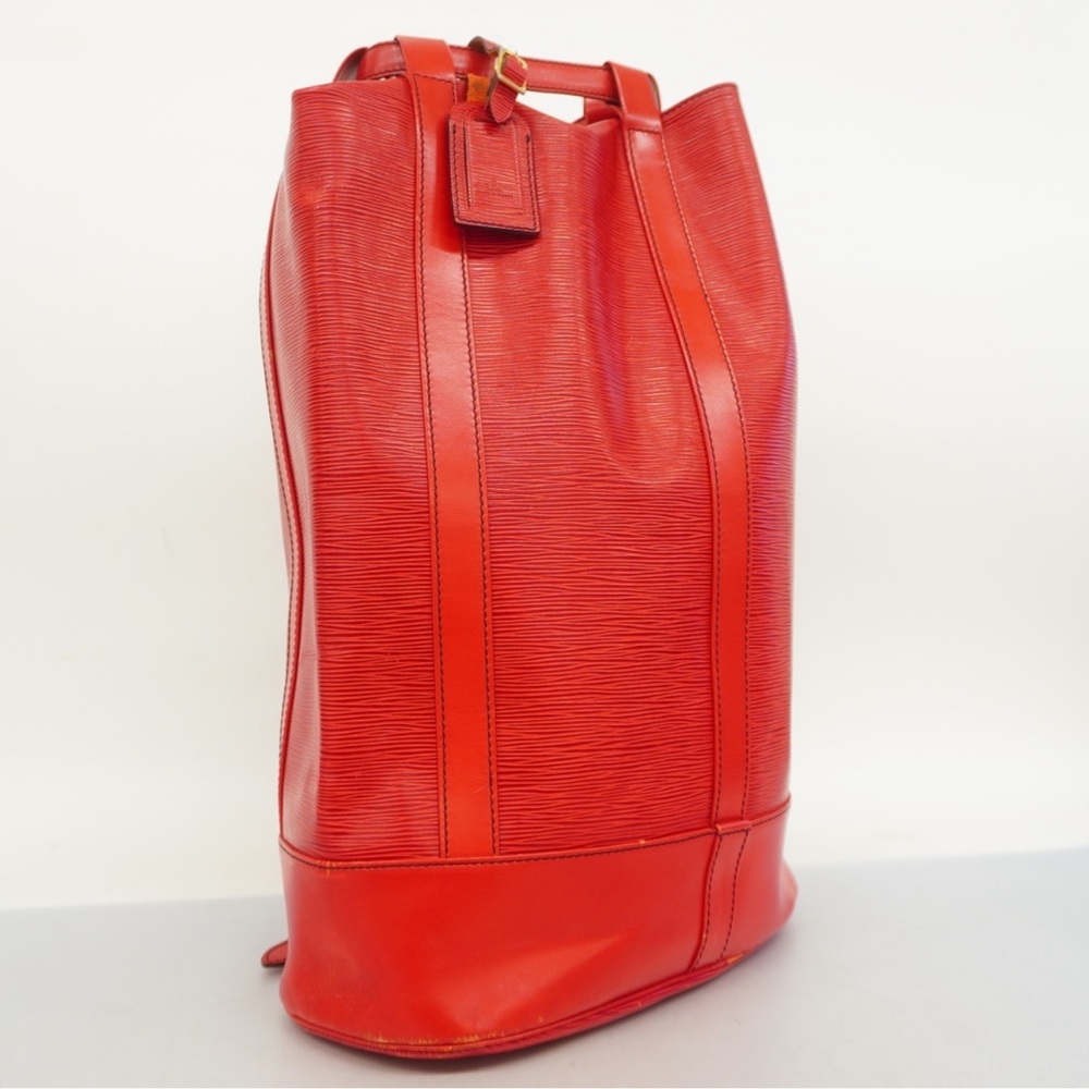Authentic Louis Vuitton Epi Randonne GM
Castilian Red